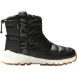 The North Face Thermoball Lace Up damestøvle i sort vatteret stof med hvid sål, set fra siden